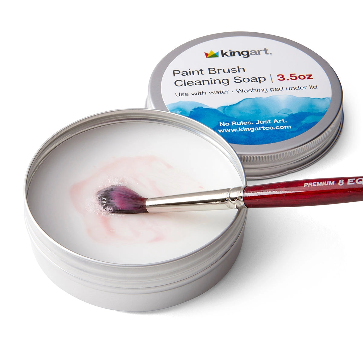 Paint brush cleaning soap in a tin with a brush inside, next to its packaging on a white background.