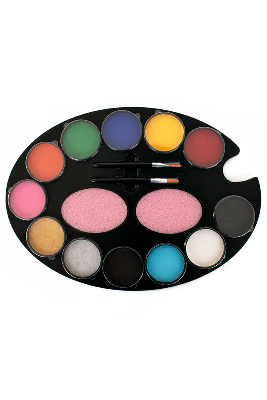 face painting palette with various colours and a brush on a white background
